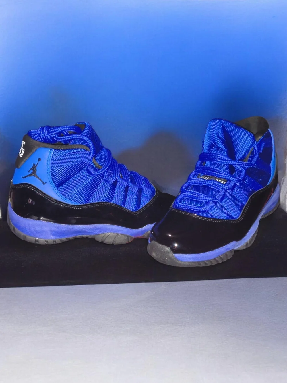 Jordan Retro 11 Sneakers in Royal Blue and Black